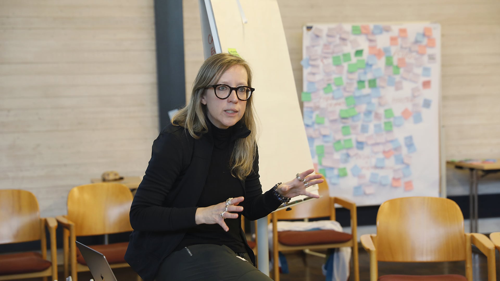 Woman sat down presenting